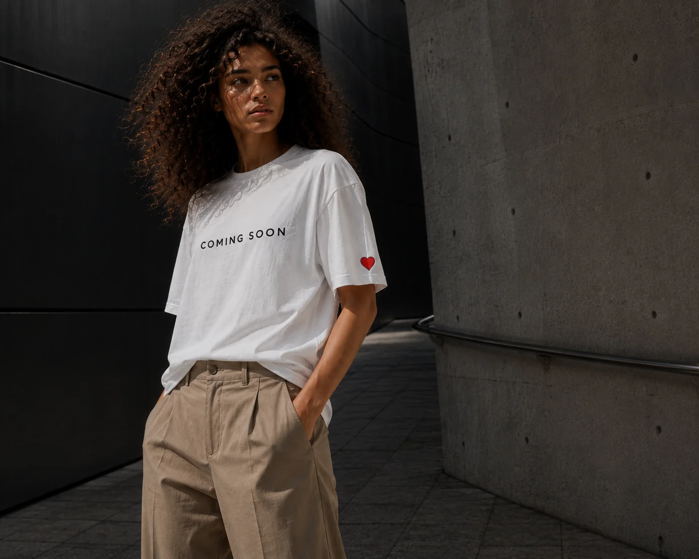 Contemporary fashion model posing in a stylish outfit showcasing modern apparel design